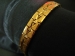 18K Goudgevulde armband met motief