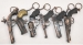 Diverse pistool replica sleutelhangers